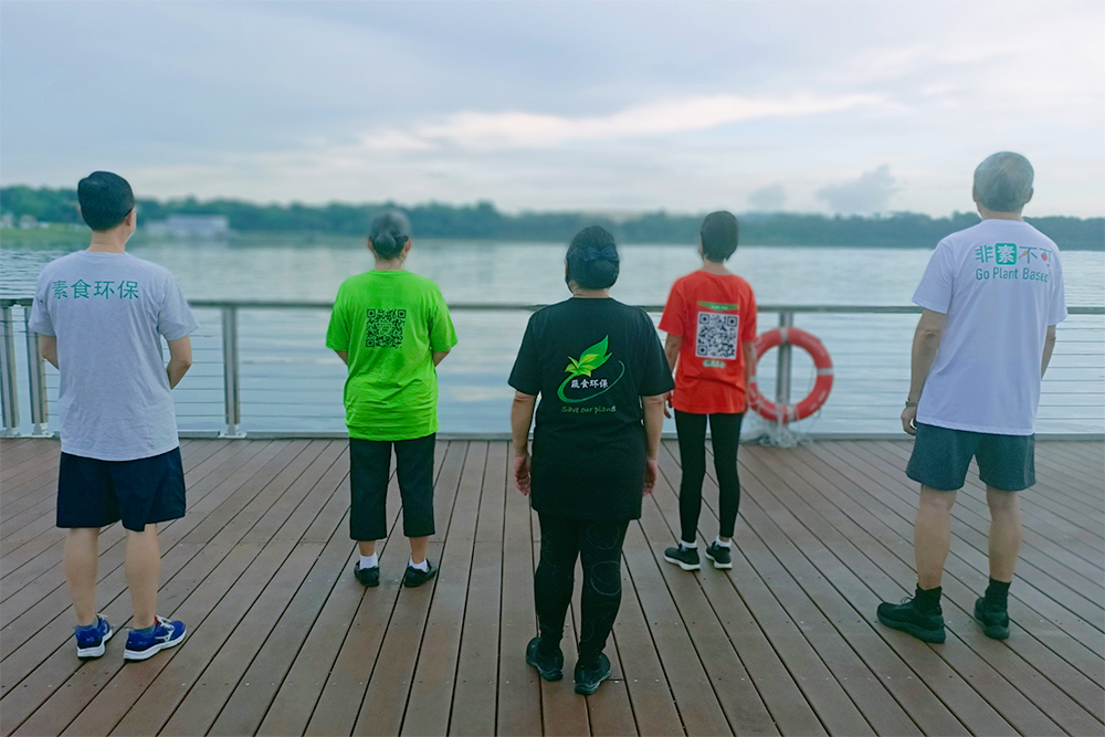 The Vegetarian T-shirts come in various styles and colours – some are printed with a QR code for the public to scan while others show a simple and powerful slogan on the back. (Photo by Ee Choon Kang)